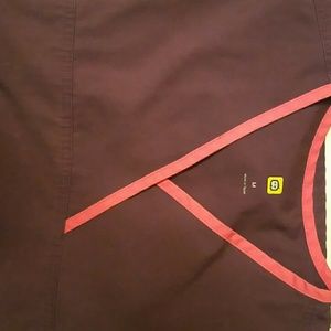 Purple scrub top trimmed in pink